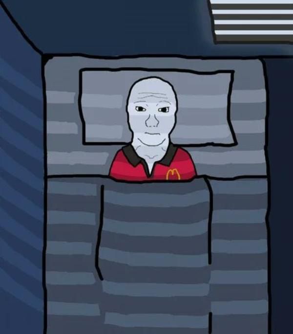 McWojak in bed wearing McDonald's uniform